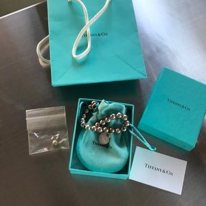 Tiffany silver ball bracelet with heart charm